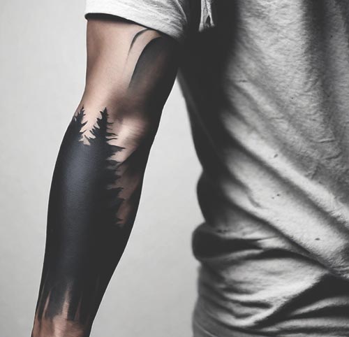 tatuaje blackout brazo